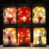 Six boxed rose flower teddy bears in red, pink and cream with LED lights lit