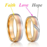 Rose gold wedding rings with silver crystal line design standing side by side