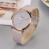 Rose gold case women's watch with textured grey dial and blush pink strap