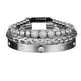 Silver three piece bracelet stack with crystal charm and Roman numeral bar
