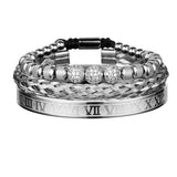 Silver three piece bracelet stack with crystal charm shown on white background