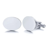 Pair of silver oval cufflinks with plain brushed faces on white background