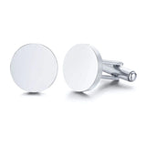 Pair of flat silver round cufflinks with mirror finish on white background