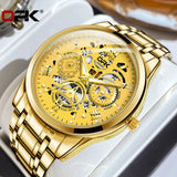 Gold OPK watch with black skeleton dial and gold steel link bracelet