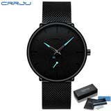 Black mesh band watch with black dial and silver hands