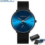 Blue mesh band watch with dark blue dial and silver hands