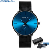 Blue mesh band watch with blue gradient dial and silver hands