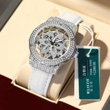 Silver women's watch with crystal set bezel, rotating snowflake dial and white strap in gift box
