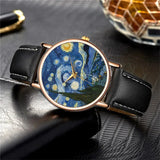 Starry Night dial watch with black strap photographed on a dark textured surface