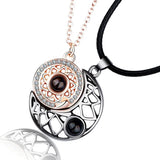 Rose gold sun pendant necklace with projection stone and black cord