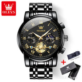 Black case watch with black dial and sun moon subdials displayed beside a gift box