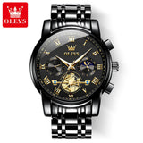 Silver case watch with black dial and sun moon subdials displayed beside a gift box