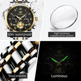Watch dial shown glowing in the dark highlighting luminous hands and markers