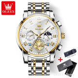 Two-tone silver and gold case watch with white dial displayed beside a gift box
