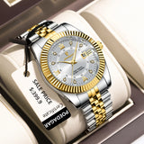 Two-tone silver and gold watch with fluted bezel displayed in a box with sale price tag
