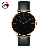 Silver case black dial watch with black leather strap front facing view