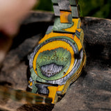Multicolor camouflage wooden watch shown at an angled detail view