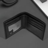 Brown leather bifold wallet opened to show card slots and note compartment