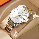 Silver watch with pale champagne dial and stainless steel bracelet