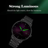 Graphic showing luminous hands glowing in the dark on a steel bracelet watch