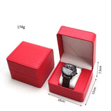 Red PU leather watch case open displaying a watch inside