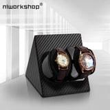 Black triangular dual watch winder rotating two automatic watches