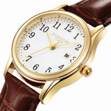 Gold case women's watch with white numeral dial and brown leather strap
