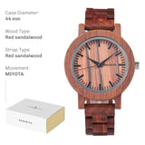 Dark ebony wood watch with pale dial and black wood link bracelet, spec card layout