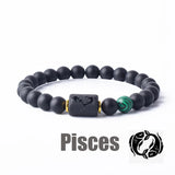Dark stone bead bracelet with Pisces zodiac symbol charm