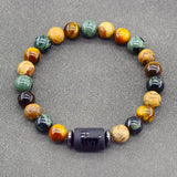 Tiger eye and jasper bead bracelet with dark engraved zodiac bar charm