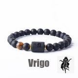 Dark stone bead bracelet with Virgo zodiac symbol charm