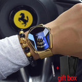 Gold mesh HOURSLY watch with angular blue dial worn on a wrist inside a car