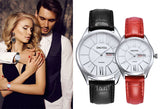 Couple wearing matching black and red leather strap watches together